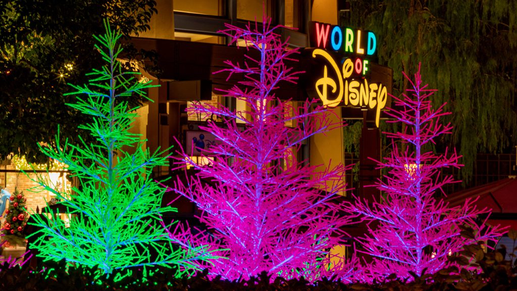 Featured image for “New ‘Let It Glow’ Trees are Merry and Neon Bright in Downtown Disney District at Disneyland Resort”